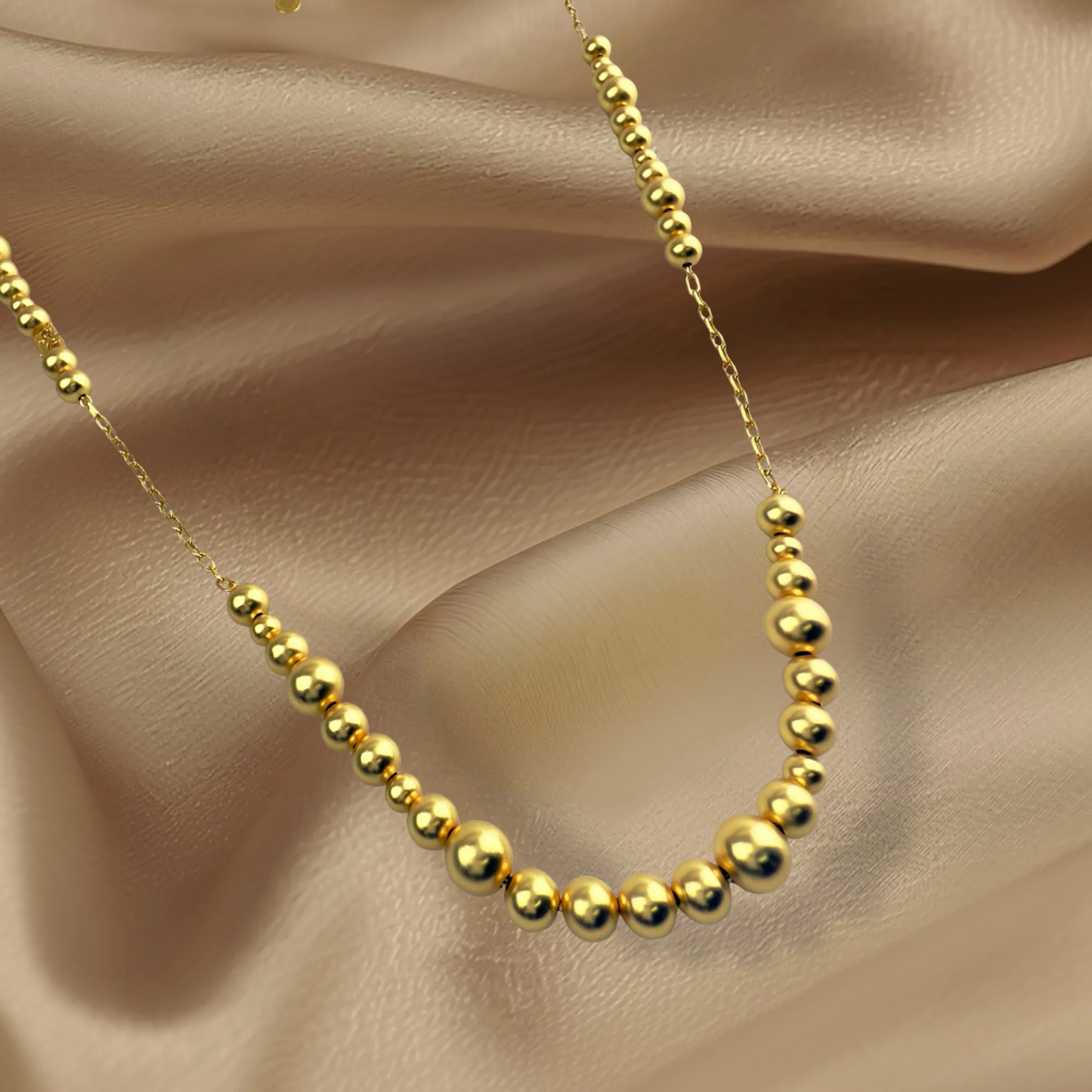 Long Dotti necklace matt gold plated