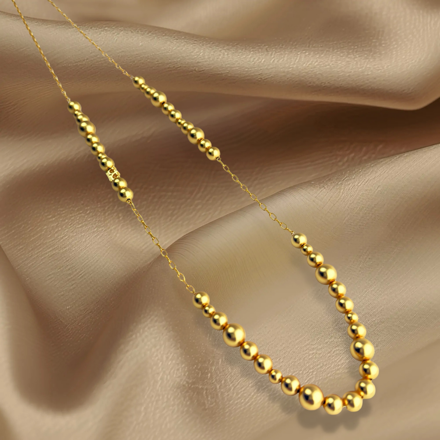 Long Dotti necklace matt gold plated